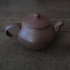 brown plasticine teapot made by Andrzej Bero